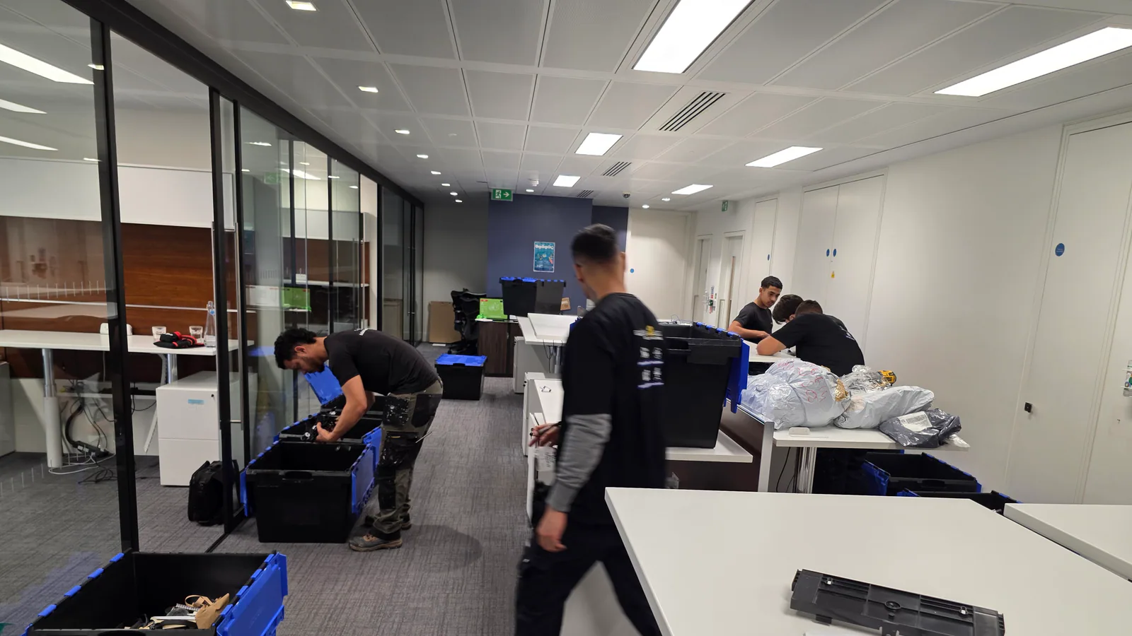 Oneplace2save team working during an office reconfiguration