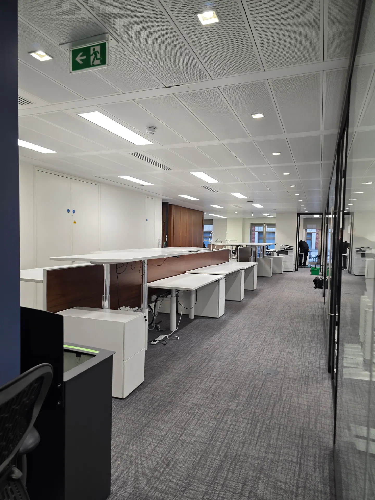 Completed workstations after an office reconfiguration.